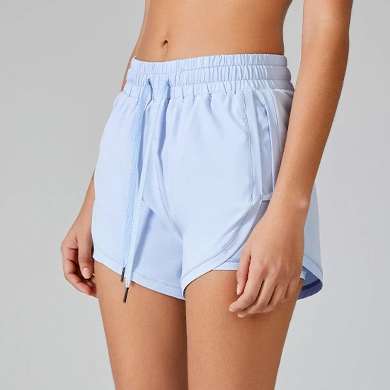 Short de course élastique fluo pour femme – Parfait pour la course et le fitness.