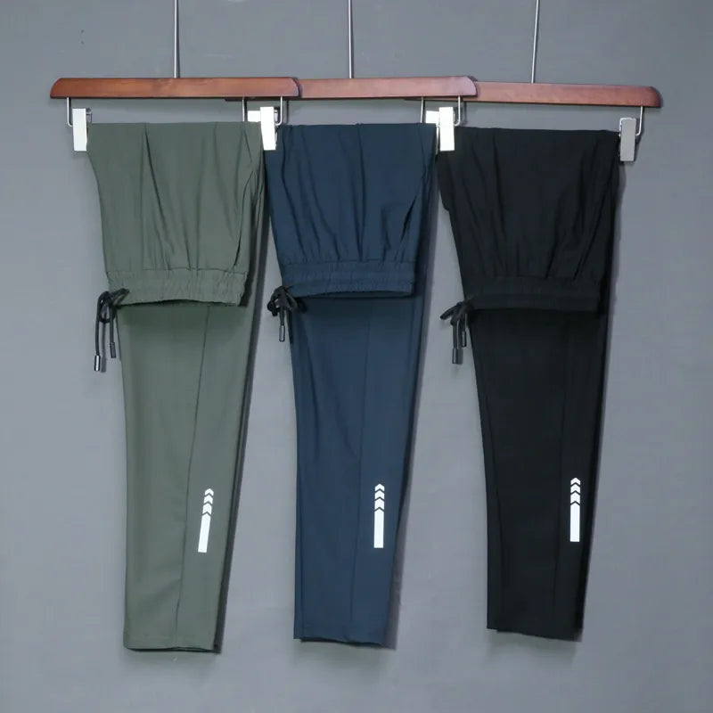 Pantalon de survêtement de course élastique d'été pour hommes - Pantalon d'entraînement extérieur décontracté pour la salle de sport et le fitness