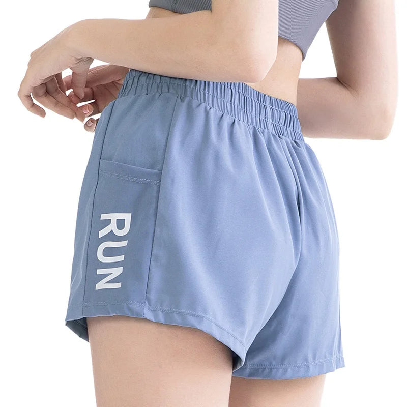 Short de sport coupe ample pour femme – Taille haute pour la course, le fitness et le yoga, avec technologie de séchage rapide.